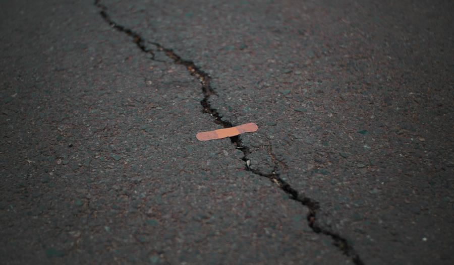 cracked ground, pavement, bandaid